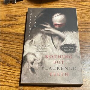 Nothing But Blackened Teeth Book